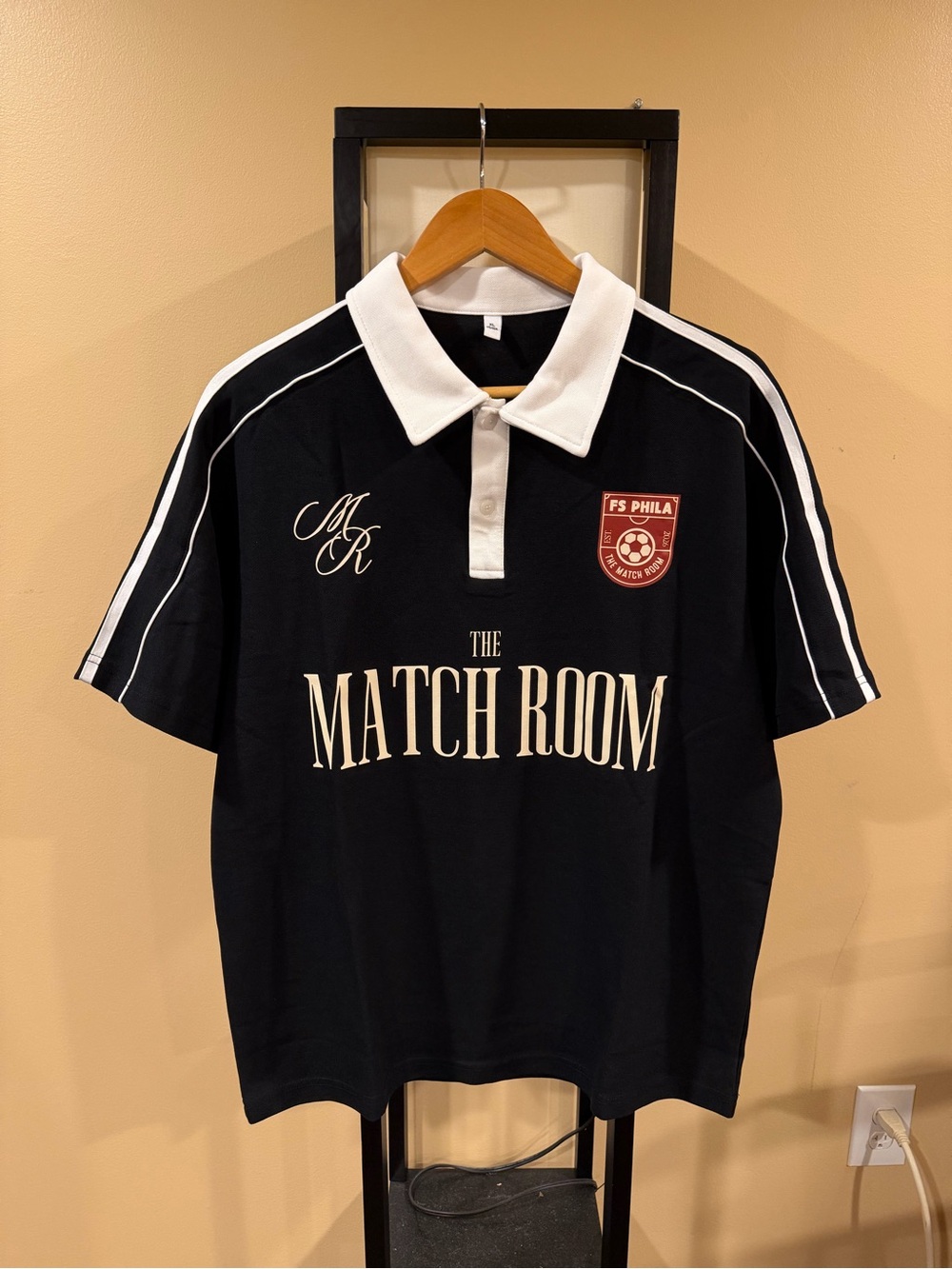 Four Seasons Philly 2026 “The Match Room” Merch Black Polo Soccer Jersey Shirt
